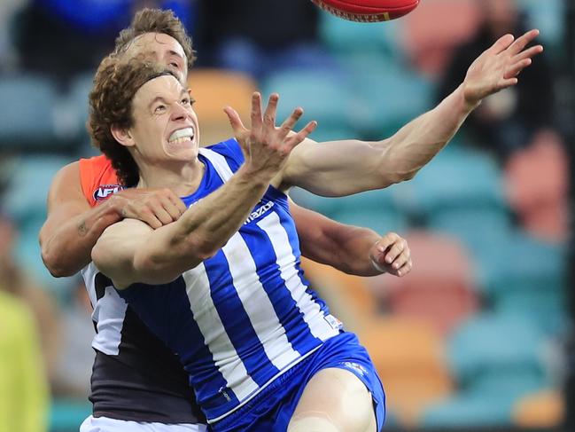 Ben Brown of the Kangaroos attempts a mark during the Round 9 AFL match between the North Melbourne Kangaroos and the Greater Western Sydney (GWS) Giants at Blundstone Arena in Hobart, Saturday, May 19, 2018. (AAP Image/Rob Blakers) NO ARCHIVING, EDITORIAL USE ONLY