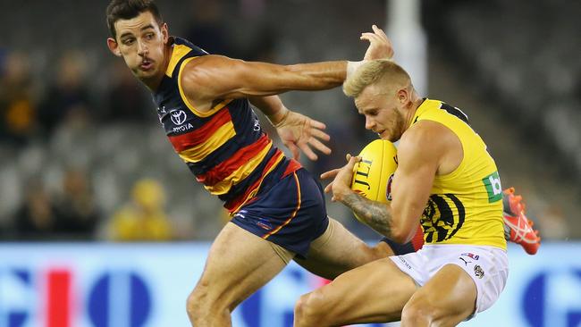 Taylor Walker and Brandon Ellis go toe-to-toe on Friday night. Picture: Getty Images