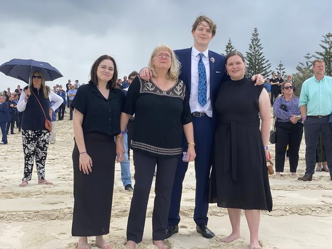 Anna Craven (Callum Devenport's partner), stands with Lindy Pickford, Callum Devenport and Zoe Devenport as they watch Peter Devenport's ashes rowed out to sea. Picture: Amaani Siddeek