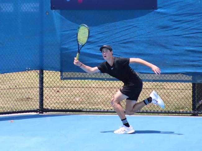 Australian tennis star Elijah Dikkenberg in action during the first round of the ITF World Tennis Tour Cairns Tennis International against fellow Australian Nicholas Jovanovski. Picture: Jake Garland