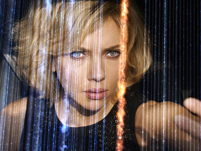 Scarlett Johansson, as the title character, develops some serious brain power in action thriller &lt;i&gt;Lucy&lt;/i&gt;.