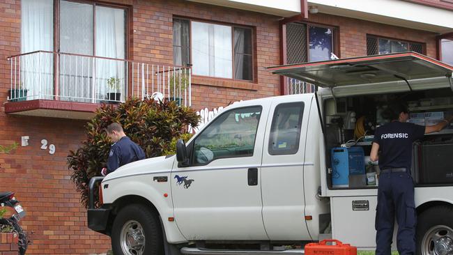 Police attend the flat where toddler Kyhesha-Lee Joughin was found dead. Photo: Steve Pohlner