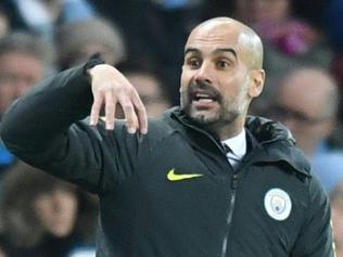 Manchester City's Spanish manager Pep Guardiola reacts on the touchline during the English Premier League football match between Manchester City and Watford at the Etihad Stadium in Manchester, north west England, on December 14, 2016. / AFP PHOTO / Anthony DEVLIN / RESTRICTED TO EDITORIAL USE. No use with unauthorized audio, video, data, fixture lists, club/league logos or 'live' services. Online in-match use limited to 75 images, no video emulation. No use in betting, games or single club/league/player publications. /