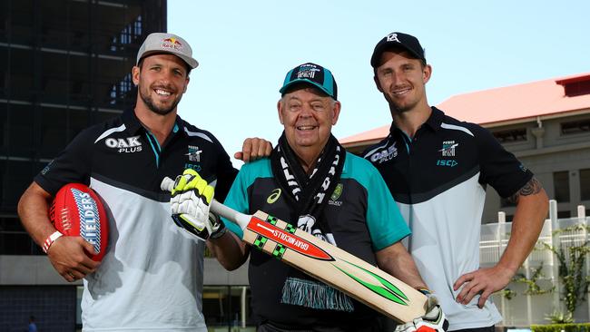 Port Adelaide players Travis Boak and Hamish Hartlett with cricket icon Barry 'Nugget' Rees. Picture: Simon Cross