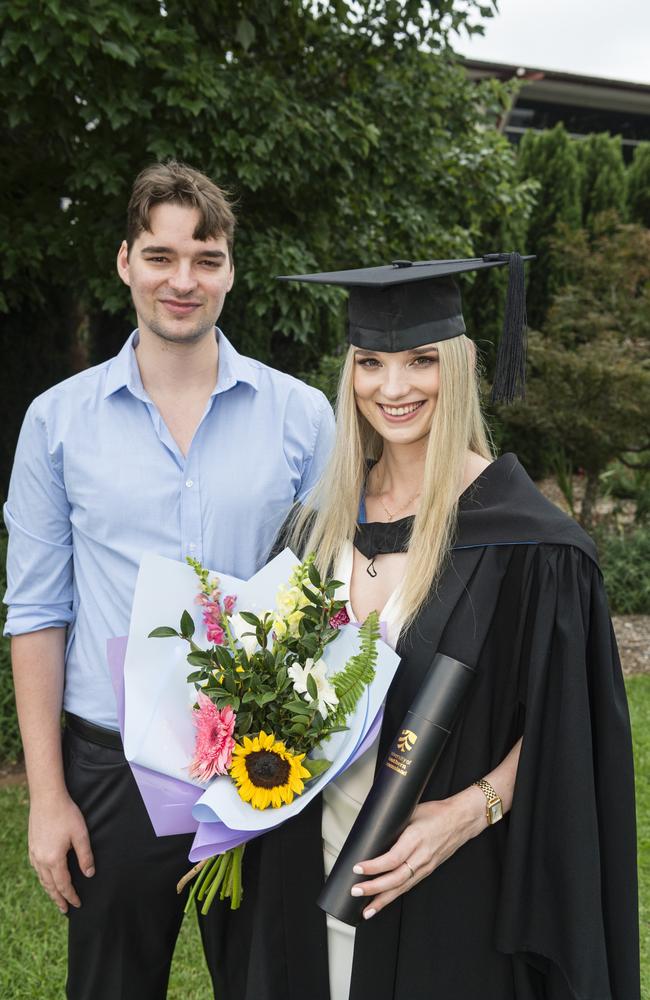 Bachelor of Science (Psychology) graduate Eliza Meara with her brother Jonathan Meara at a UniSQ graduation ceremony at Empire Theatres, Tuesday, February 13, 2024. Picture: Kevin Farmer