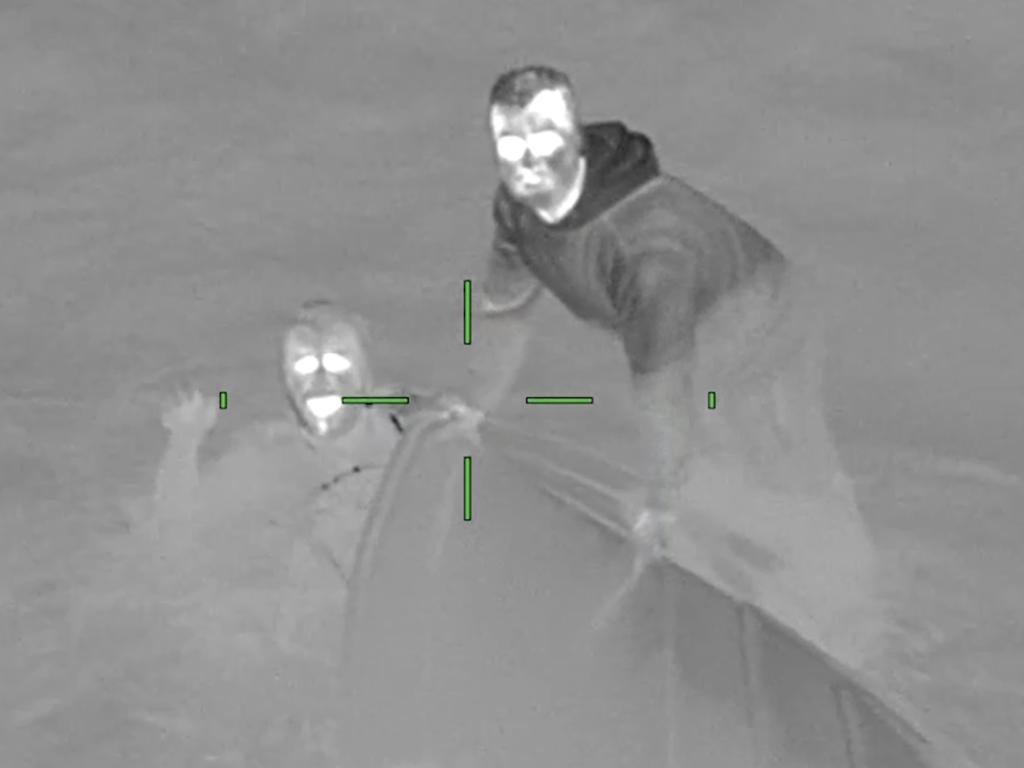 The men were all smiles when they were discovered by police Air Wing. Picture: Victoria Police