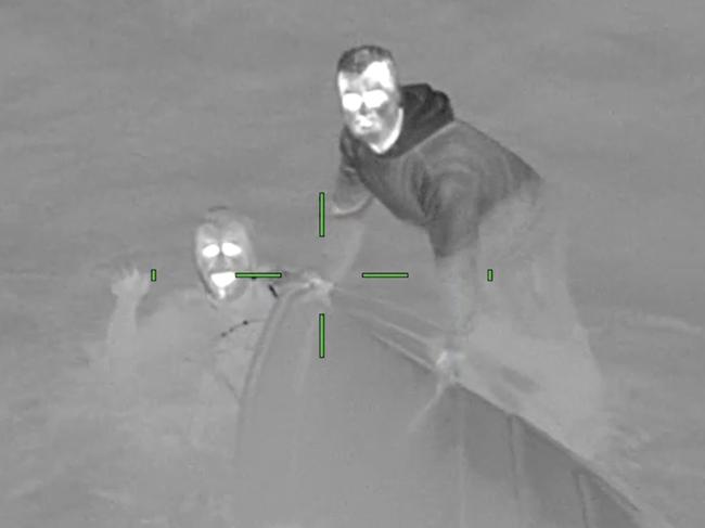 The men were all smiles when they were discovered by police Air Wing. Picture: Victoria Police