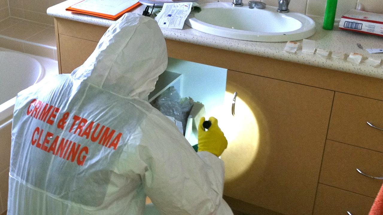 Cleaning up at a house where a meth lab was discovered. File photo.