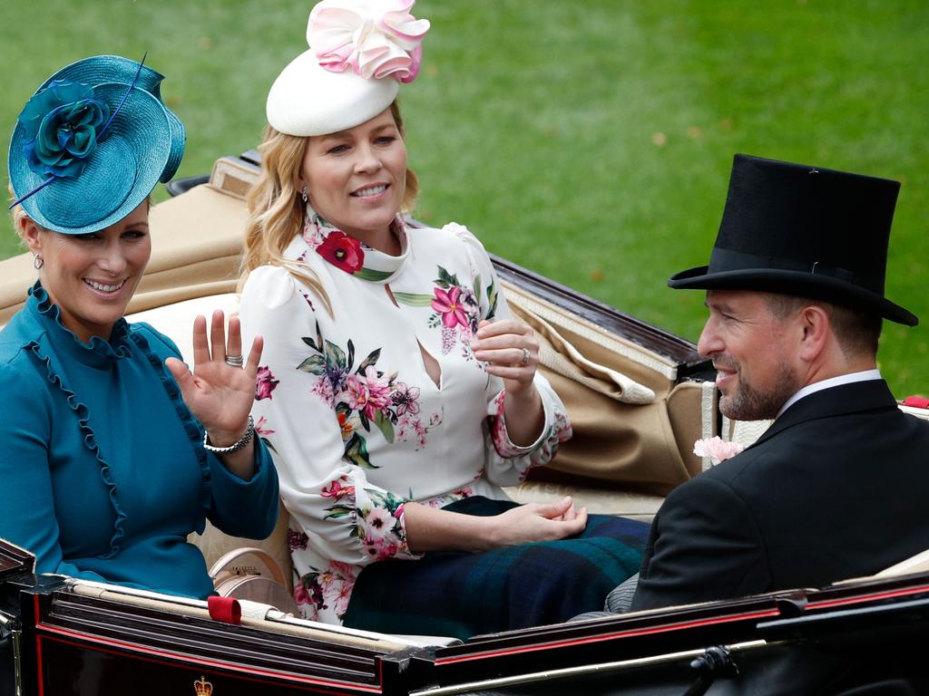 Zara Phillips (L) with Peter and Autumn Phillips at Ascot. Picture: AFP