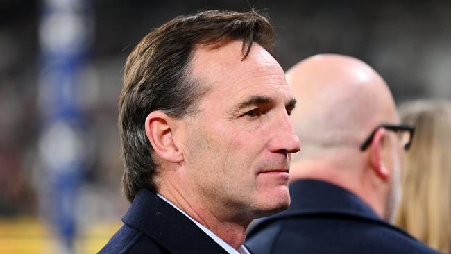 MELBOURNE, AUSTRALIA - MAY 25: AFL CEO Andrew Dillon watches on in the Long Walk during the round 11 AFL match between Richmond Tigers and Essendon Bombers at Melbourne Cricket Ground, on May 25, 2024, in Melbourne, Australia. (Photo by Morgan Hancock/AFL Photos/via Getty Images)