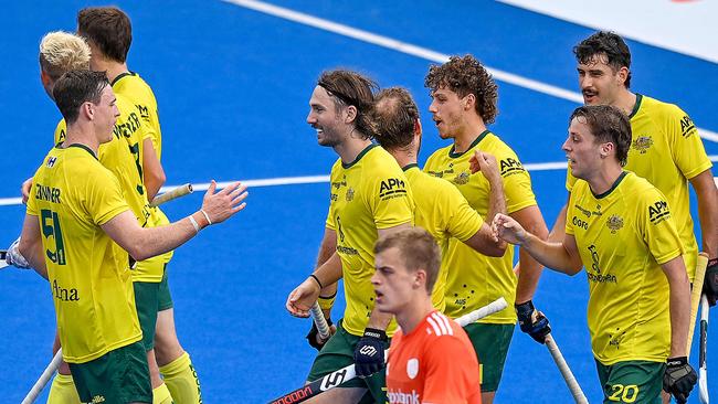 Australiaâs players celebrate after scoring a goal during the men's field hockey match between Australia and Netherlands in the FIH Hockey Pro League in Sydney on February 9, 2025. (Photo by Izhar KHAN / AFP) / -- IMAGE RESTRICTED TO EDITORIAL USE - STRICTLY NO COMMERCIAL USE --