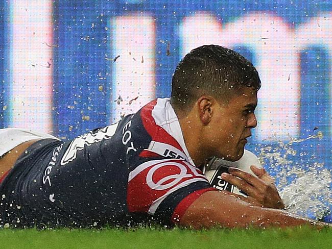 Roosters Latrell Mitchell scores a try during the Wests Tigers v Sydney Roosters rugby league game at Allianz Stadium, Sydney. Pic Brett Costello