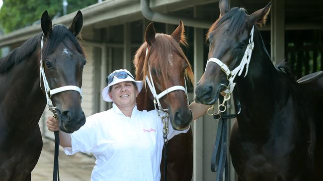 Winning hand: Trainer Desleigh Forster with Cylinder Beach, Too Good To Refuse and I’m Belucci. Picture: Jono Searle