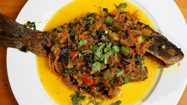 Black fish a Bengali dish of pan fried fish with garlic, ginger, onion, shallots, coriander and cumin from Khushboo Sweets &amp; Restaurant in Lakemba. Picture: Jonathan Ng