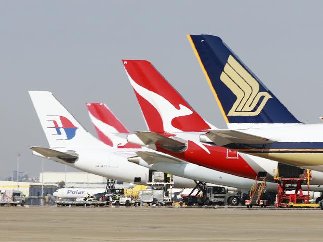 DO NOT USE, EMBARGO, HOLD COURIER MAIL FUTURE TOURISM CAMPAIGN Airside airplanes at the International Terminal of Brisbane Airport on Friday, August 30, 2019. (AAP Image/Claudia Baxter)