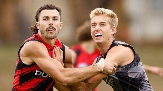 MELBOURNE, AUSTRALIA - JANUARY 16: Sam Draper of the Bombers and teammate Nick Bryan in action during the Essendon Bombers AFL training session at The Hangar on January 16, 2025 in Melbourne, Australia. (Photo by Michael Willson/AFL Photos via Getty Images)