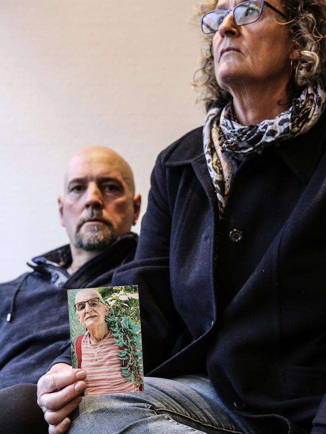 Searle and Donna Stratton in Bendigo. Donna holds a photograph of her father Colin. Picture: Julian Kingma