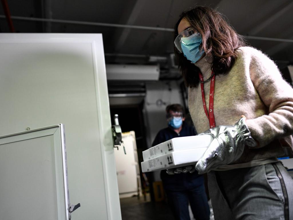 A worker stores boxes of Pfizer-BioNTech COVID-19 vaccines in an ultra low temperature freezer in the AP-HP central pharmacy on the outskirts of Paris. Picture: AFP