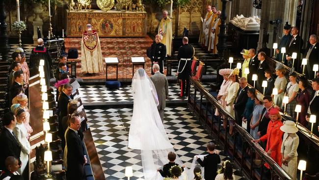 Prince Charles walked Meghan Markle down the aisle. Picture: AFP PHOTO / Owen Humphreys