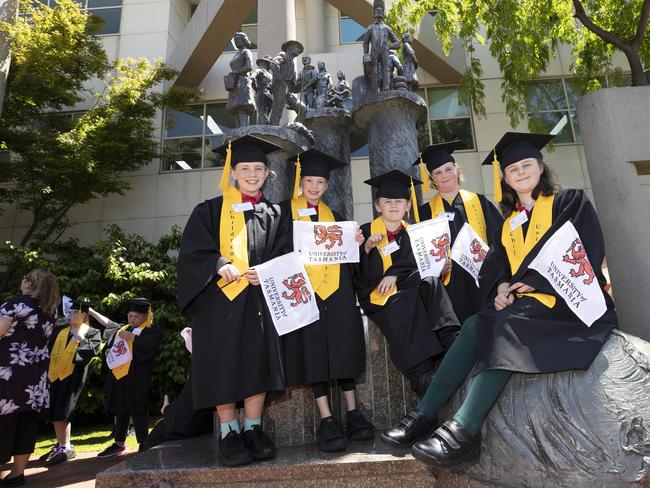 Yolla District School, Sarah Gardner 11, Lily Newman 8, Beau Neilson 9, Harrison Hiller 11, Cheyenne Weilson 11 at the UTAS Graduation at Burnie. PICTURE CHRIS KIDD