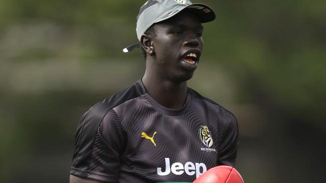 Bigoa Nyuon trains for the first time as a Richmond player.