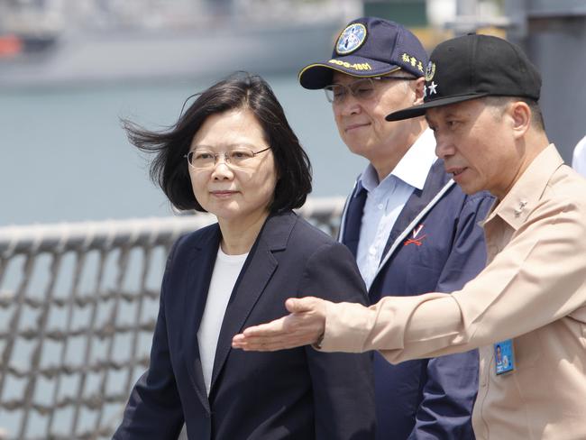 Taiwan’s President Tsai Ing-wen, left, boards a destroyer during a navy exercise on April 13. Picture: Chiang Ying-ying