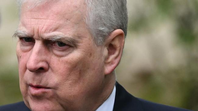 Britain's Prince Andrew, Duke of York reacts as he leaves St. George's Chapel, in Windsor Castle, after attending the Easter Mattins Service, on March 31, 2024. (Photo by JUSTIN TALLIS / AFP)