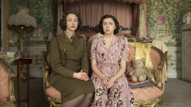 Sarah Gadon as Elizabeth and Bel Powley as Margaret in <i>A Royal Night Out</i>.