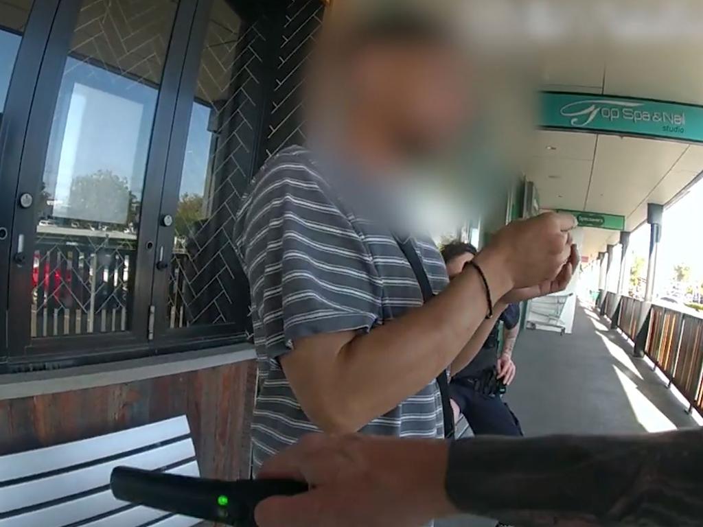 Officers conduct wanding and charge a man for possession of a knife in a public space at a Gladstone shopping centre.