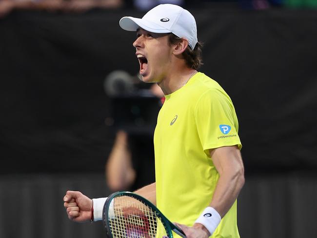 PERTH, AUSTRALIA - JANUARY 03: Alex de Minaur of Team Australia celebrates winning his singles match against Novak Djokovic of Team Serbia during day six of the 2024 United Cup at RAC Arena on January 03, 2024 in Perth, Australia. (Photo by Paul Kane/Getty Images)