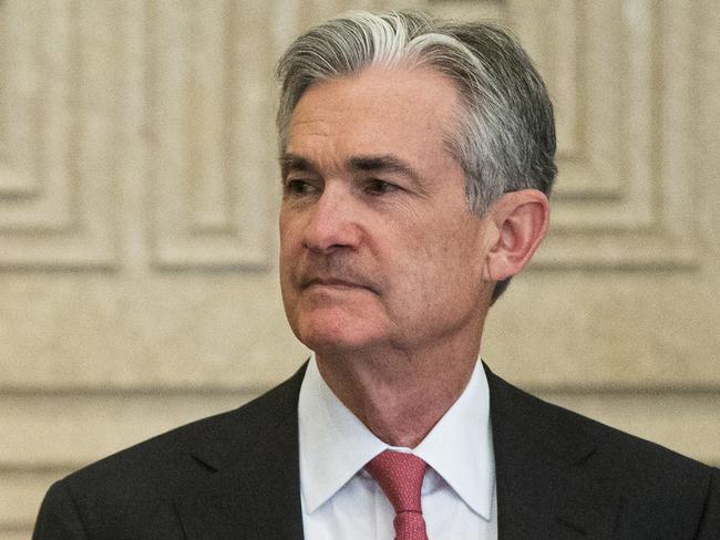 FILE - In this Monday, Nov. 30, 2015, file photo, Federal Reserve Gov. Jerome Powell talks with others before a Board of Governors meeting at the Marriner S. Eccles Federal Reserve Board Building in Washington. President Donald Trump said Tuesday, Oct. 17, 2017, that he is likely to make his selection for the next Federal Reserve chairman from five candidates, a group that includes Powell. (AP Photo/Andrew Harnik)