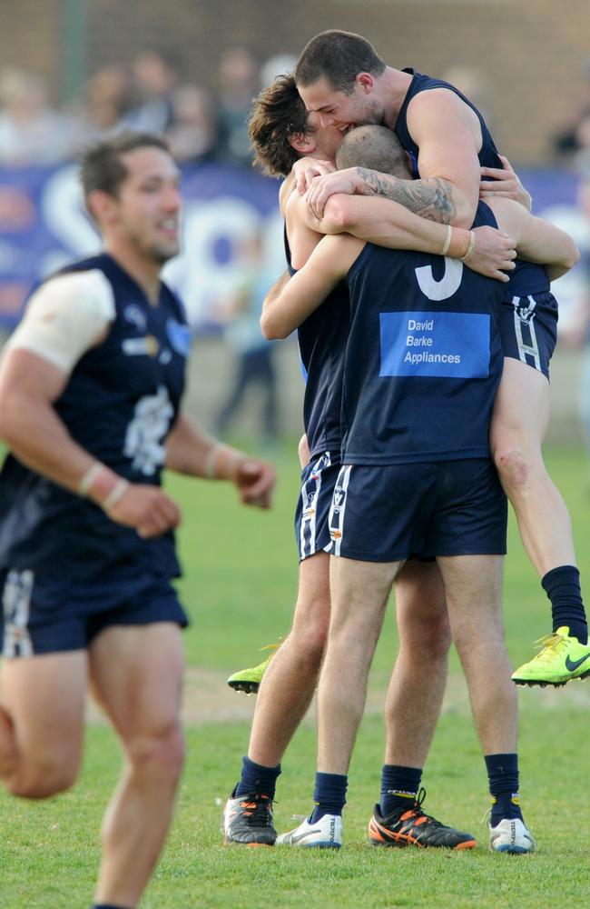 Rosebud teammates celebrate after the final siren. Picture: Andrew Henshaw