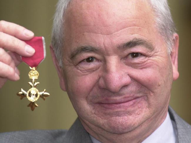 FILE - This is a Oct. 27, 2000 file photo of British author Colin Dexter after receiving an Order of the British Empire. Writer Colin Dexter, who created music-loving Oxford detective Inspector Morse, has died aged 86. Publisher Pan Macmillan said Dexter died Tuesday March 21, 2017 at his home in Oxford England.ï»¿ (John Stillwell/PA, File via AP)