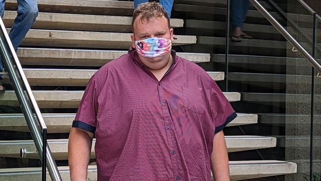 Christopher James Biffin, 30, asked his "internet girlfriend" to take part in a fantasy exchange where he asked her to pretend to be a teenager. He quickly donned a mask as he left the Townsville courthouse on Thursday.