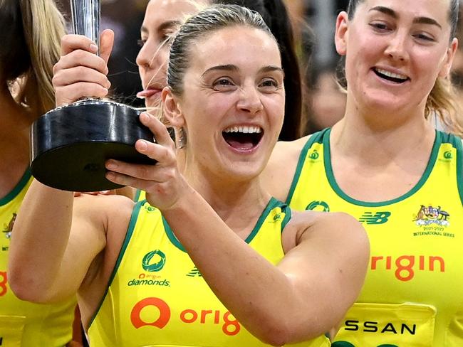 GOLD COAST, AUSTRALIA - OCTOBER 23: Liz Watson of Australia holds up the Constellation Cup as the Australians celebrate victory after the Constellation Cup match between the Australia Diamonds and New Zealand Silver Ferns at Gold Coast Convention and Exhibition Centre on October 23, 2022 in Gold Coast, Australia. (Photo by Bradley Kanaris/Getty Images)