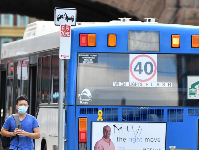 SYDNEY, AUSTRALIA - NewsWire Photos MARCH, 24, 2021: Passengers wearing face masks leaving a bus at Central train station in Sydney. Picture: NCA NewsWire/Joel Carrett