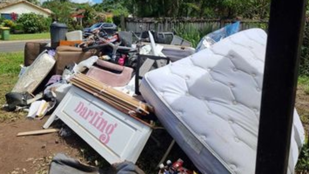 Water damaged possessions lie out the front of the Tarana Close rental property in Caravonica. Picture: Supplied