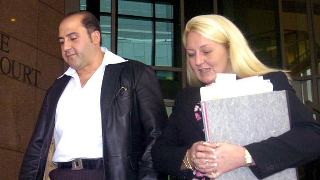 Tony Mokbel leaves Melbourne Magistrates’ Court with his lawyer, Nicola Gobbo.