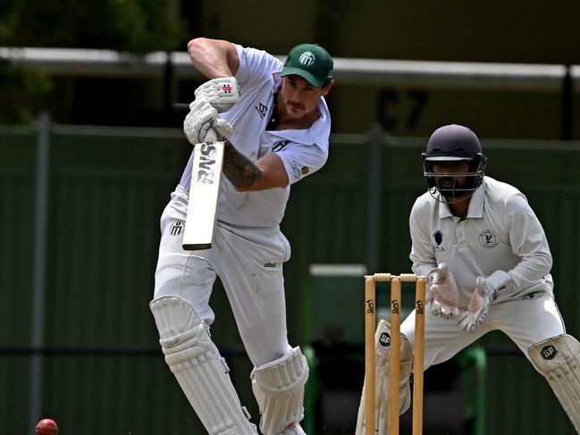 CraigieburnÃs Jake Carlisle and Yarravile ClubÃs Sangaran S Nandhalal during the VTCA Yarraville Club v Craigieburn cricket match in West Footscray, Saturday, Nov. 26, 2022. Picture: Andy Brownbill