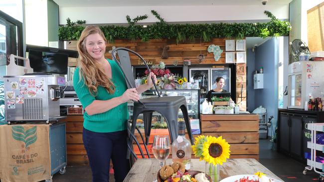 Cafes are getting ready to reopen across the Gold Coast and owner Chantel Kruger from Quay St Cafe and Bar at Sanctuary Cove is looking forward to unstacking the chairs. Picture: Glenn Hampson