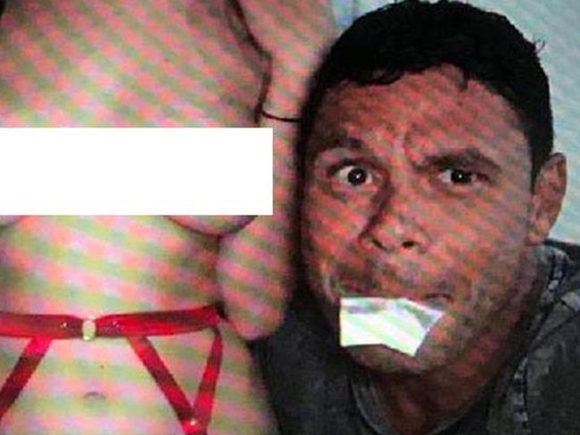 Telv with two bags of white powder in his mouth and a half-naked woman. Picture: Woman’s Day