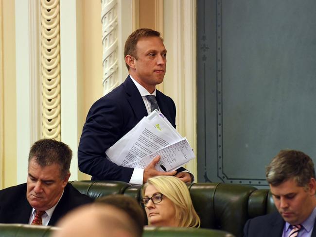 Health Minister Steven Miles leaves the chamber after he was ejected by the Speaker during Question Time yesterday. Picture: Dan Peled/AAP