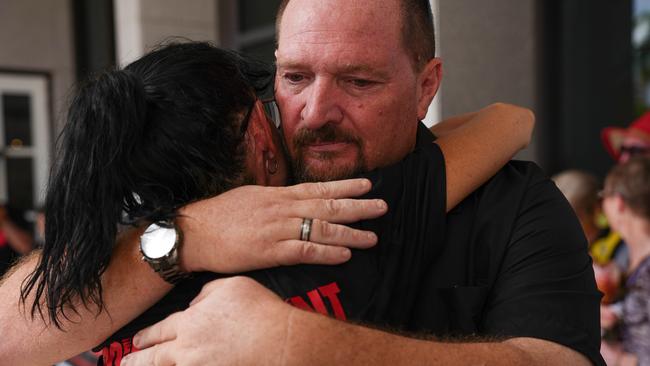 Damian Crook embracing rally organiser Cobie Campbell. Picture: Pema Tamang Pakhrin