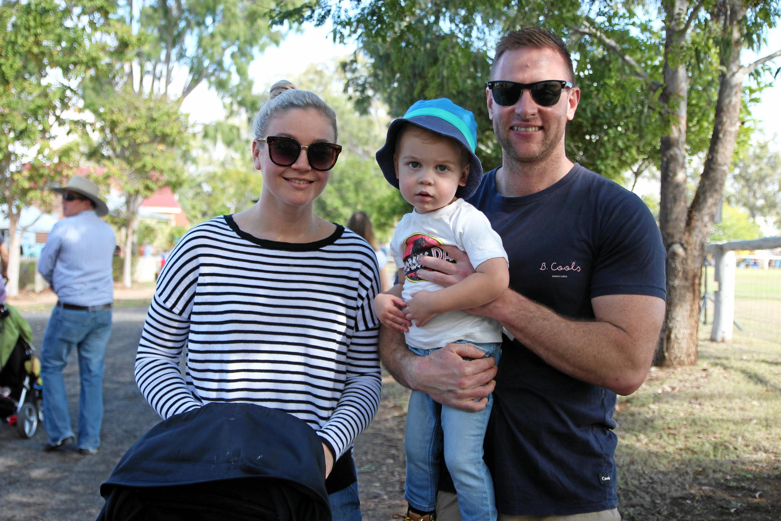 Kasen Stevens, Daniel Stevens and little Jaxon Stevens enjoy a family day out at he Emergency Services Day in Rockhampton. Picture: Shayla Bulloch