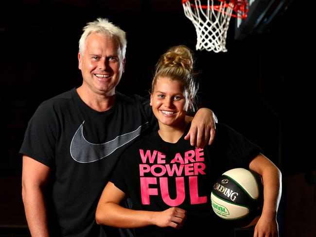 WEEKEND TELEGRAPHS SPECIAL. MUST TALK WITH PIC ED JEFF DARMANIN BEFORE PUBLISHING - Shyla Heal, daughter of Boomers basketball legend Shane Heal pictured with her dad at Sutherland Basketball Stadium before moving to North Queensland where she has been signed to the Townsville Fire for the upcoming WNBL season. Picture: Toby Zerna