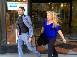 Alleged police bashing victim Corey Barker and his mother Angelique Sines leave the Sydney Downing Centre courts after giving evidence against six officers accused of assaulting him and lying in court. Picture: Chris Calcino