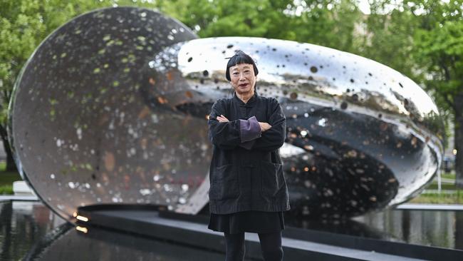 Lindy Lee and Ouroboros, her public sculpture at National Gallery of Australia in Canberra. Picture: Martin Ollman