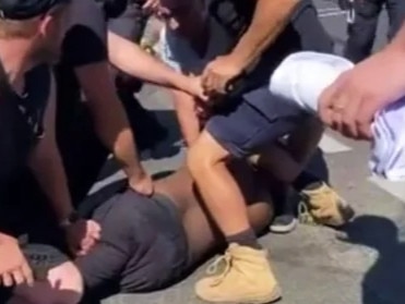 The alleged driver, Gulet Ahmed, was restrained by bystanders before police arrived. Picture: 9NEWS