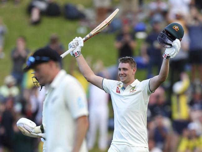 Cameron Green celebrates after reaching his hundred during the final over of the day in Wellington on Thursday. Picture: Hagen Hopkins/Getty Images.