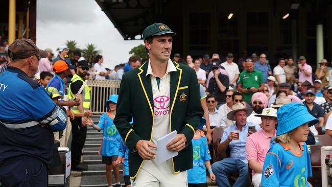 Pat Cummins walks out onto the field for the coin toss. Picture: Cameron Spencer/Getty Images